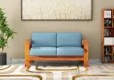 Carlotta-With-Side-Magazine-2-Seater-Wooden-Sofa-Honey-Blue(1).webp